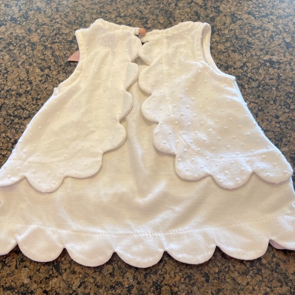 Sleeveless white top with scallops and pink bow - Picture 4 of 7